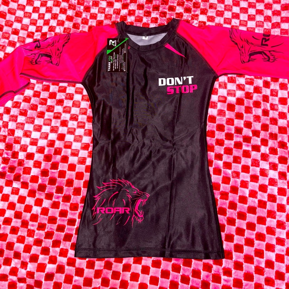 Women’s Brazilian Jujitsu Shirt. It’s a size S but is smaller, so like a XS. New